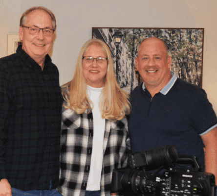 Kelly Rundle, left, with his wife Tammy and Brian Munos (John Munos' great nephew).