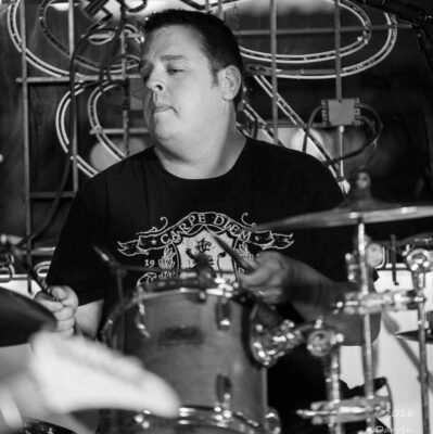 Greg Hipskind, a Moline High alum who was a longtime drummer, teacher and director of QC Rock Academy, died of a heart attack at age 49 on Jan. 2, 2026.