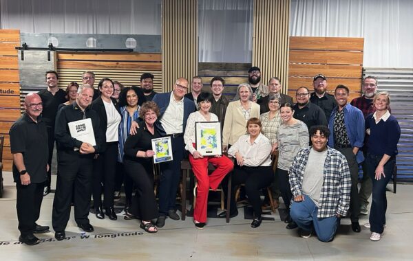 A group photo of "Come From Away" cast and some musicians, with director Lora Adams and music director Amy Trimble (center), after the show Sept. 11, 2026.
