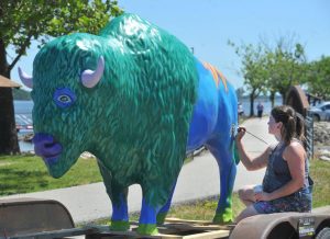 Talented Moline Artist Paints Buddy Bison to Promote Bison Bridge Project