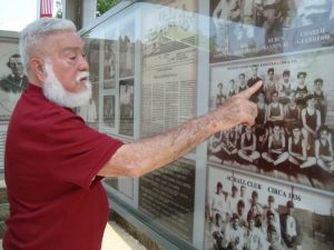 Tanilo Sandoval, a Mexican-American whose brothers Frank and Joe were killed in World War II, at Hero Street Memorial Park in Silvis.