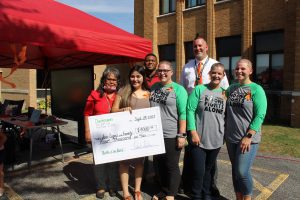 Rock Island's Denkmann Principal and Staff Shave their Heads for Student Battling Cancer