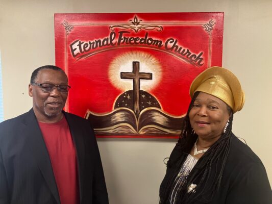 Gene Bass and his wife, Barbara, at their new Eternal Freedom Church, 3817 W. Locust St., Davenport, July 20, 2026. (photo by Jonathan Turner)