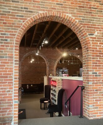Pop the Cork is in the former WaterMark Corners gift shop, which operated from 1999 until it closed in early 2024, including a Corner Bar there from 2021 until closing. (photo by Jonathan Turner)