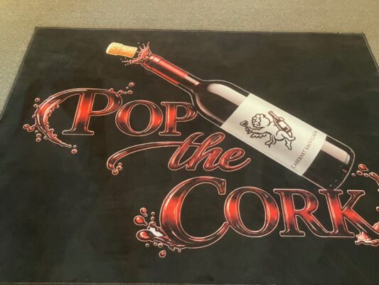 Pop the Cork opened at the former WaterMark Corners in downtown Moline June 22, 2026. (photo by Jonathan Turner)