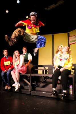 Jack Bevans goes airborne during Music Guild's new production of "The 25th Annual Putnam County Spelling Bee."