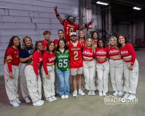 Colin Gould and his wife Lexie pose with Steamwheelers dancers and a player on the night of their last home game at Vibrant Arena July 25, 2026. (credit: Brad Foster Photography)