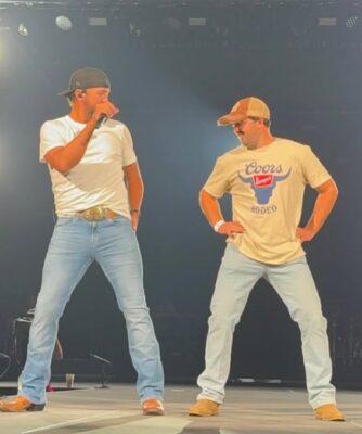 Luke Bryan with Colin at Vibrant Arena, July 10, 2026.